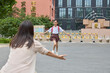 © Blue Jean Images - Mum picking up her daughter from school