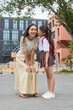 © Blue Jean Images - Mum taking her daughter to school