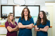 © Gonzalo Infiesta - Female veterinarians and assistants posing at veterinary practice
