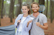 © auremar - happy couple playing badminton in nature