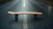 © AkuAku - Rain dotted road featuring wooden skateboard and blue wheels viewed from side plus text placement area