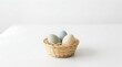 © rioyoungguns - Pastel Easter Eggs in Basket