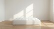 © vxnaghiyev - Serene minimalist bedroom featuring a lone mattress resting on smooth wooden flooring bathed in soft natural light