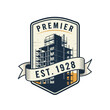 © robi - Premier Construction Established 1928 Shield Logo with Buildings Under Construction and Crane, Urban Development Design on Isolated White Background.