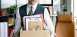 © be free - Fired jobless employee. Unemployment crisis of man dismissed. Business man packing stuff. Last day at work. Upset office worker fired. Fired and unemployment with business man cropped view. Job loss