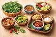 © nnteam - Thai Food Garnish Set in Traditional Containers Isolated – Herbal Leaves, Chili, Lime and Condiments