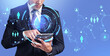 © ImageFlow - A business person holding a tablet with glowing global and people icons in digital style on a blue background, concept of network communication