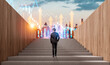 © ImageFlow - Business person on stairs looking toward city skyline with glowing charts on sunset background, concept of finance growth and success