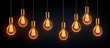 © Creative-Touch - Row of vintage light bulbs glowing on black background