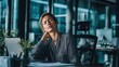 © Mykola - Tired businesswoman massaging neck at a desk after long laptop work in a modern office