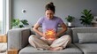 © Flash memory - Woman sitting on sofa suffering from severe stomach ache. Illustration of inflamed human intestine area. Physical pain and medical disorder concept. Healthcare and digestive system disease.