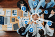 © InfiniteFlow - A vibrant office scene showcasing professionals engaged in teamwork, data analysis, and strategic brainstorming to drive innovation and achieve business goals effectively. Amity