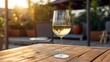 © Magic Stock - A photo of a glass of chilled white wine on a table