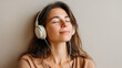 © Ruzana - Serene woman relaxing with headphones and eyes closed in peaceful moment
