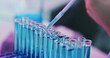 © peopleimages.com - Science. person and test tubes in lab, liquid for chemistry experiment and research. Medical results, scientist or glass vials with syringe, biotech for pharmaceutical innovation or vaccination