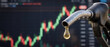 © TanTin - Worn gasoline petroleum fuel nozzle, soaring oil price graph of energy market surge crisis growth trends display in blurred dark background. Copy space