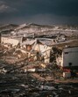 © Ryzhkov - Industrial building roof collapse after storm showing severe tornado damage and debris on an industrial site for insurance claim and news coverage reporting