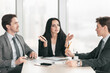 © alotofpeople - businessmen at a table in an office