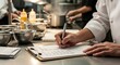 © Badang - Chef Checks Inventory.