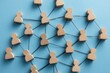 © Worrapol - Network of Connections: Symbolic wooden figures linked together, illustrating the concept of interconnectedness, collaboration, and the power of networking in a modern, streamlined aesthetic.