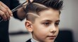 © rdkcho - Young boy getting a stylish modern haircut from a professional barber. Trendy shaved line design with precision scissors.