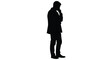 © SHYFUL_STUDIO - Silhouette of a man in a suit thoughtfully posing with hand to chin
