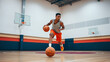 © Rachel - Athletic basketball player dribbling on indoor court, sport training and skills showcasing