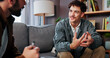 © peopleimages.com - Psychology, therapist and happy man talking for help, mental health advice or support in office. Counseling session, life coach and people in therapy for assessment, consultation and evaluation