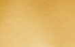 © Chinnapong - Gold background foil golden leaf metallic texture gradient light shiny reflective wrapping paper bright yellow solid color wallpaper for design decoration element backdrop