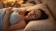 © Future Vision - Lying woman wearing light blue camisole on bed in softly lit bedroom, with pillow and lamp