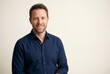 © JL&Co Awe Imaging - Smiling Casual Businessman Portrait Headshot Looking Confident And Approachable Against Neutral Background