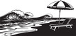 © Rajon - Beach scene silhouette with waves umbrella and lounge chair on shore.