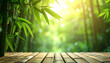 © Bediha Duru Öksüz - Bamboo forest background with wooden table and soft sunlight bokeh. Natural green environment with copy space, ideal for product display, spa, wellness and eco friendly concepts.