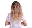 © New Africa - Woman with tangled hair on white background, back view