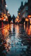 © Uliana - Blurred silhouettes walking on wet cobblestone street at night, warm city lights reflecting in rain for moody urban atmosphere.