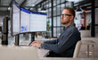 © Andrey Popov - Marketing Manager Analyzing Customer Loyalty Metrics