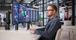 © Andrey Popov - Young Professional Managing Project Timeline On Office Computer