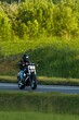 © AlexGo - Scenic road trip on a motorcycle through open fields