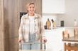 © Pixel-Shot - Mature woman with walker in kitchen