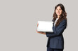 © Pixel-Shot - Female business consultant with blank laptop on light background