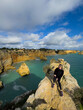 © Angelov - Beautiful natural limestone arch near Praia da Marinha in Lagoa, Portugal