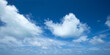 © Pakhnyushchyy - Blue sky background with tiny clouds