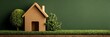 © Strother - Eco-friendly wooden house model on green grass with trees representing sustainable living, real estate investment, property mortgage, and environmental home ownership concept.