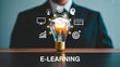 © Shameer - E learning concept with digital icons and light bulb representing online education and knowledge growth