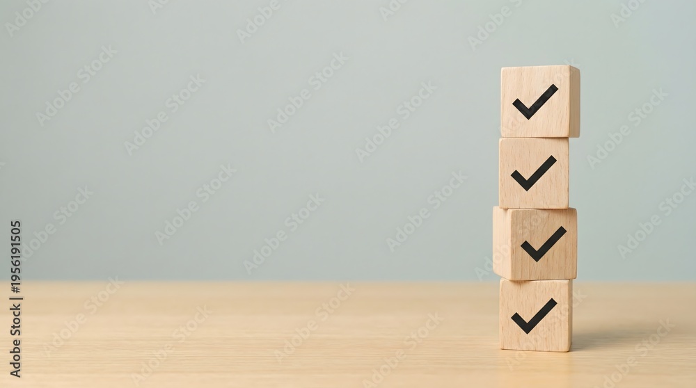 Fine Aligned Stack Perfectly aligned vertical stack of four wooden blocks, each featuring ...