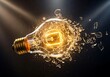 © Kabir Design - A glowing incandescent light bulb shattering into countless fragments against a dark background