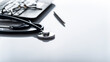 © Mikhailov Studio - Healthcare background of stethoscope laptop glasses and pen on table with copy-space