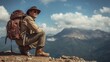 © LimeSky - Experienced hiker resting to enjoy mountain views while trekking with a heavy backpack