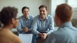 © LimeSky - Male therapist and student observing non-binary individual chatting with a teen in group therapy