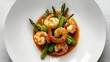© LimeSky - Garlic shrimp and asparagus stir-fry in oyster sauce on a white plate, viewed from above.
